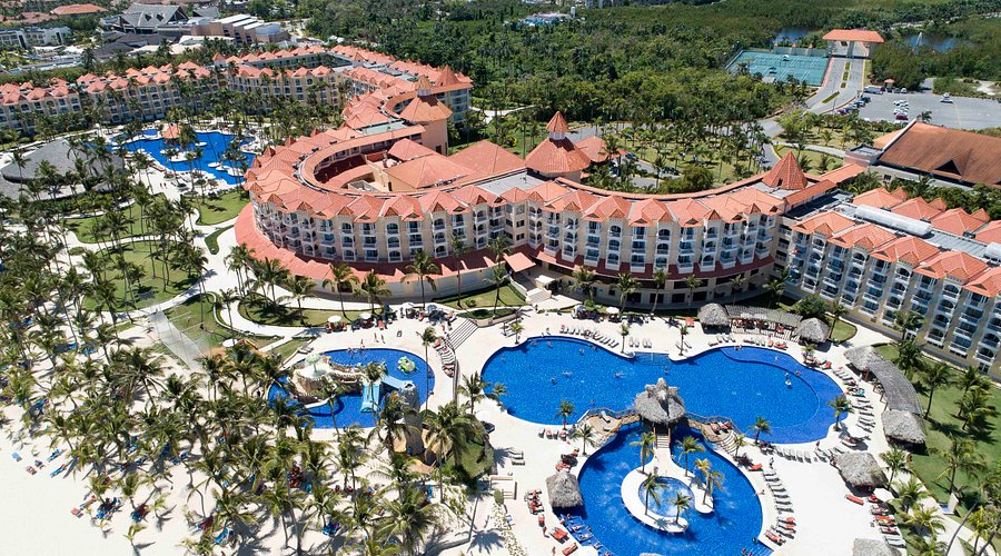 Occidental Caribe Punta Cana all-inclusive resort with beachfront pools, tropical gardens, and family amenities in Dominican Republic.